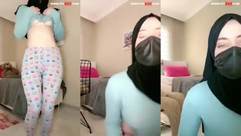 türk porno türbanlı: Türbanlı boncuk tangoda kıçını gösterip poz veriyor 